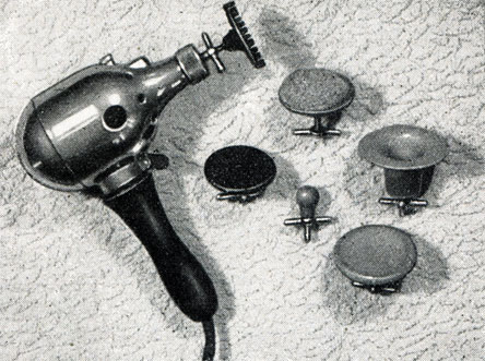 Рис. 70. Вибрационный аппарат для массажа с разными наконечниками